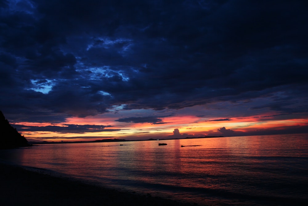 landscape photo of ocean during golden hour