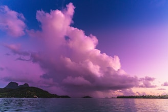 A vibrant sunset over a tropical beach, perfect for spontaneous trips.