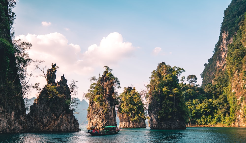 scenery of rock formation on body of water