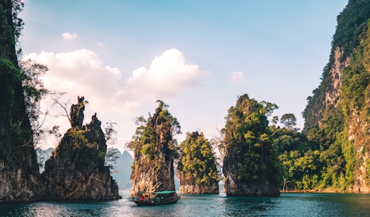 scenery of rock formation on body of water in Khao Sok National Park Thailand