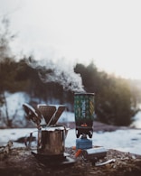 shallow focus photography of silver portable stove during daytime