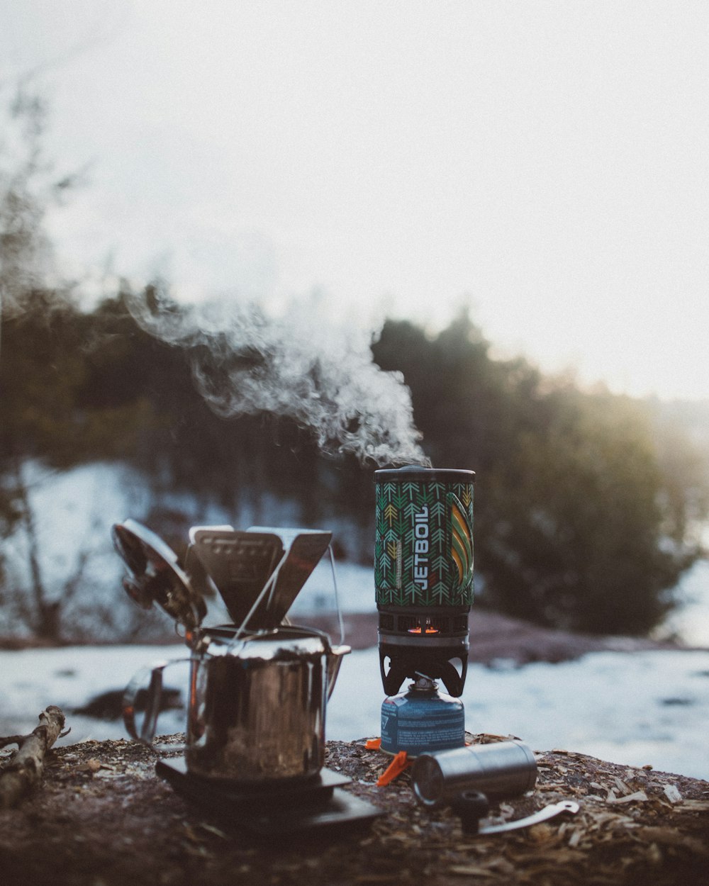 shallow focus photography of silver portable stove during daytime
