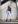 woman standing on sidewalk during daytime