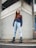woman standing on sidewalk during daytime
