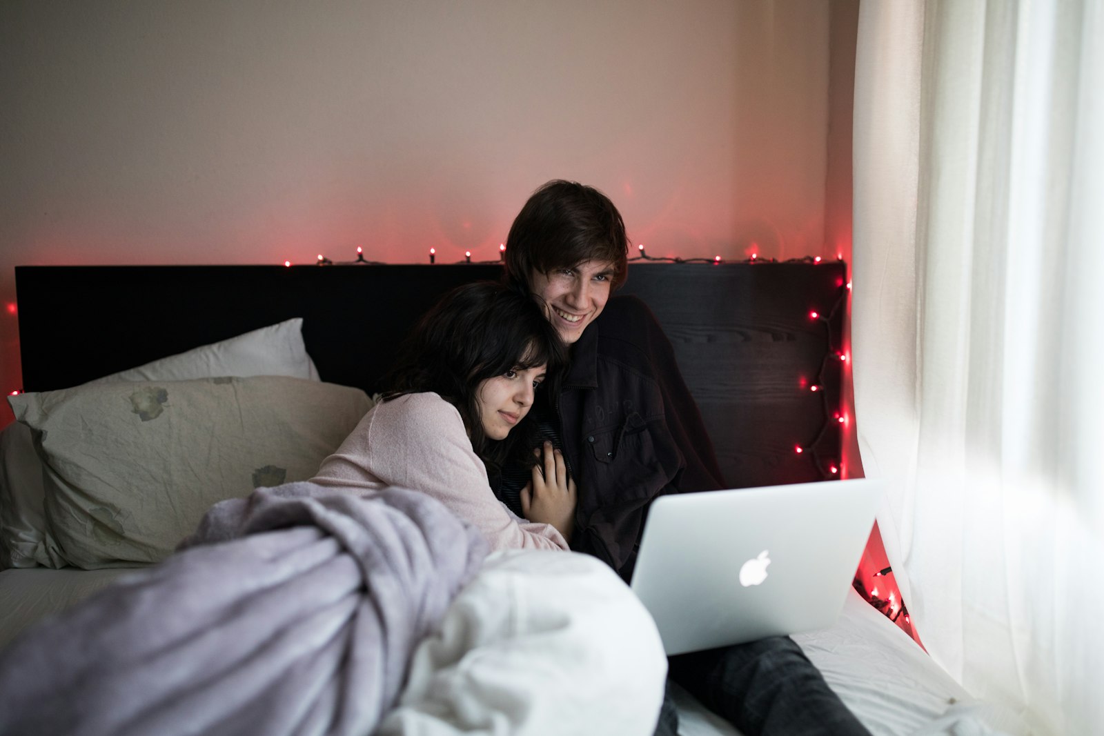 Canon EF 35mm F1.4L II USM sample photo. Couple on bed using photography