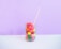 clear beverage jar wit straw on table