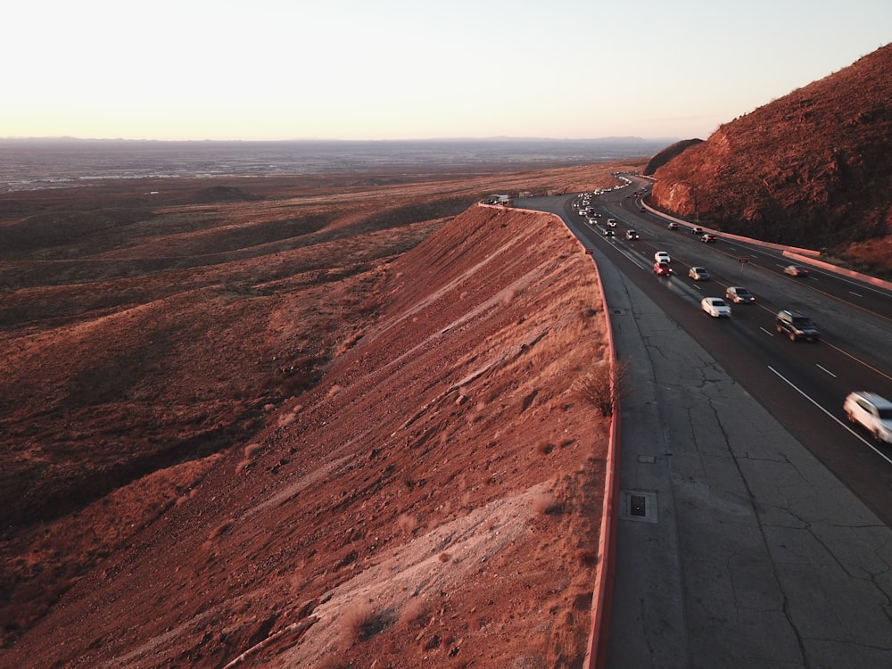 aerial photography of road and mountain