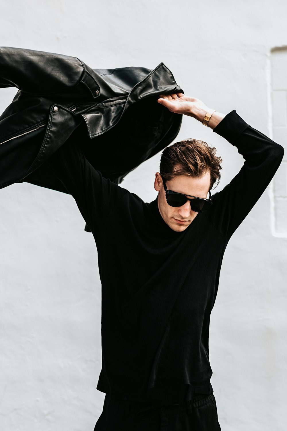 man in black long-sleeved top