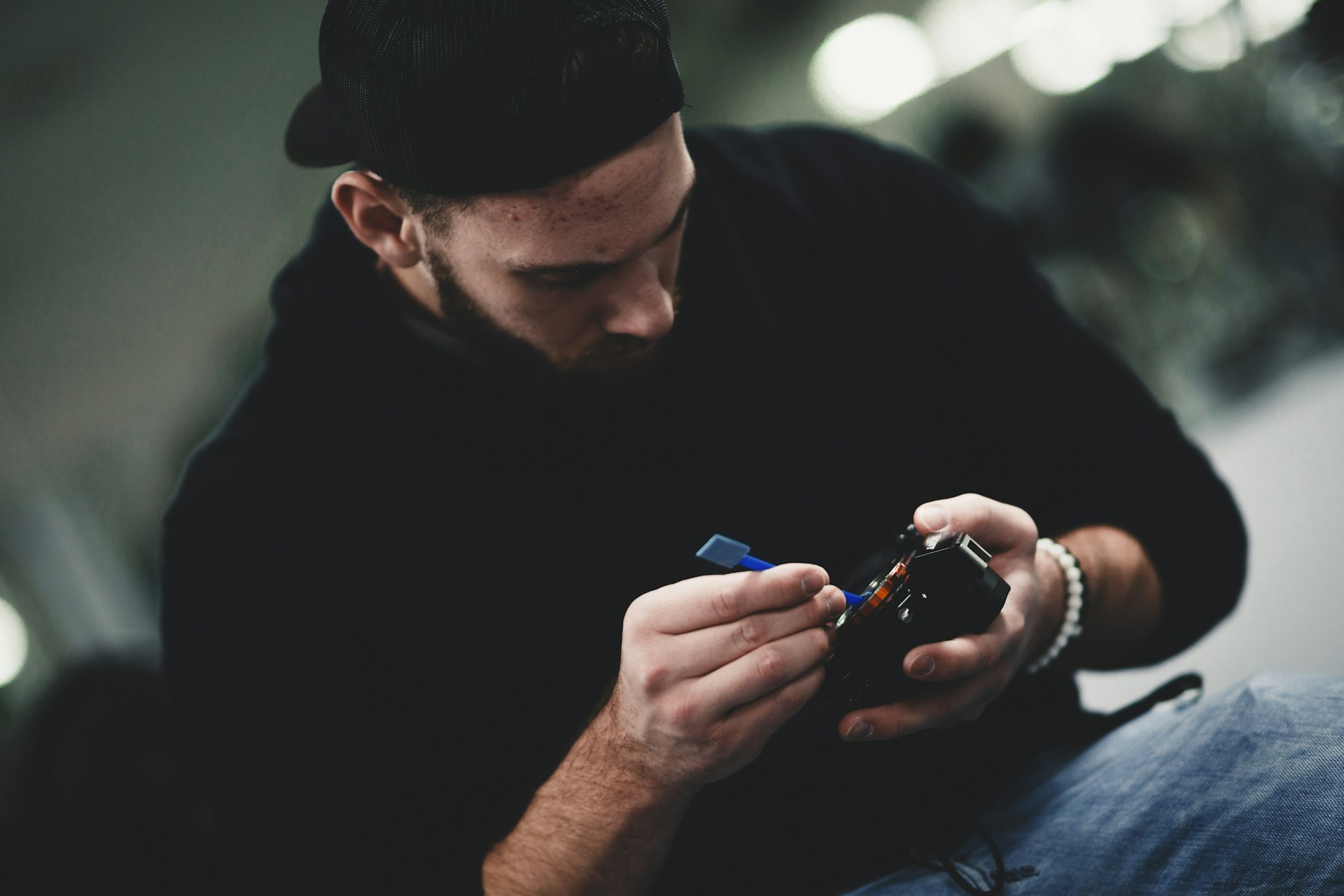 woman wearing yellow long-sleeved dress under white clouds and blue sky during daytime