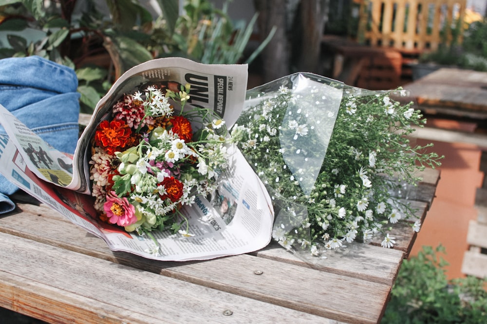 bouquet of flowers on brown wooden table