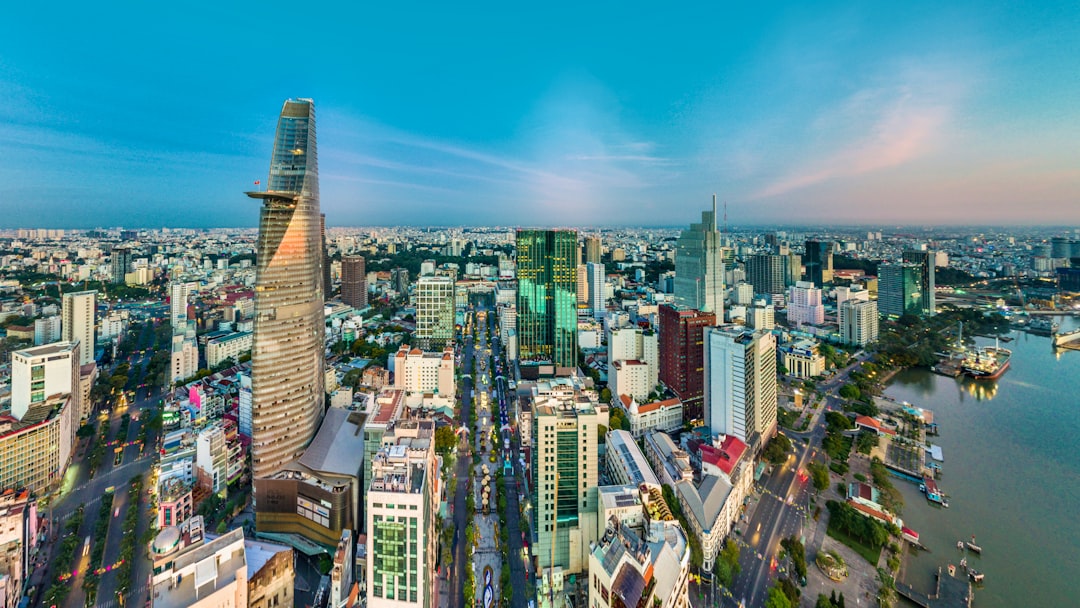 high-rise building near body of water during daytime