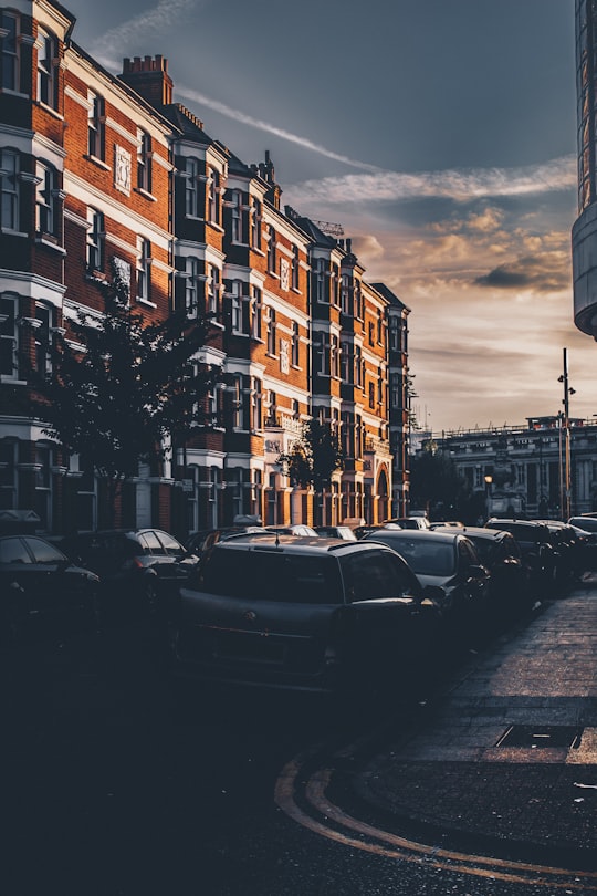 gray cars on road way under gray sky in Brixton United Kingdom