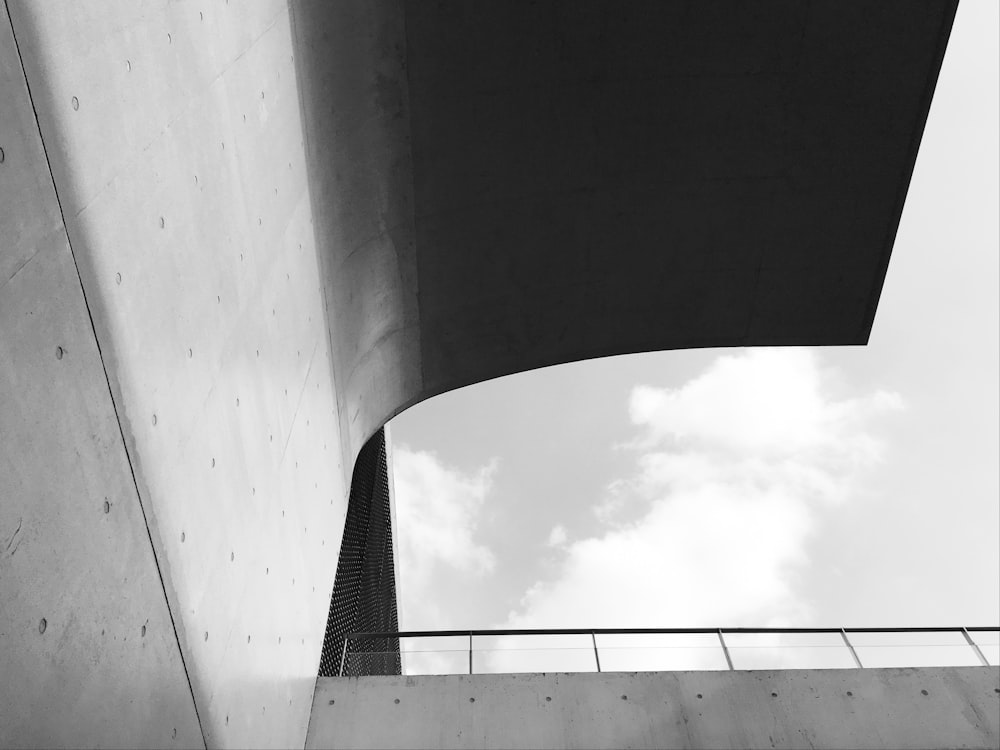 a black and white photo of a tall building