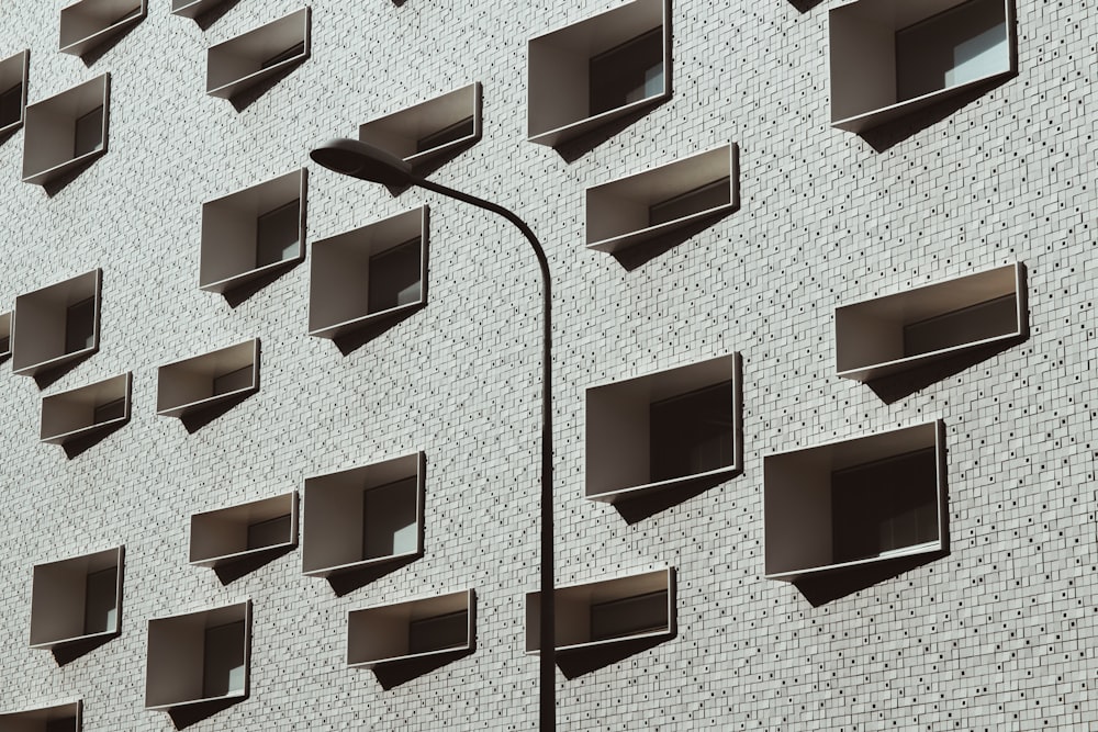 low angle photo of closed building windows