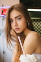 woman in white sleeveless top