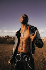man wearing unzipped jacket