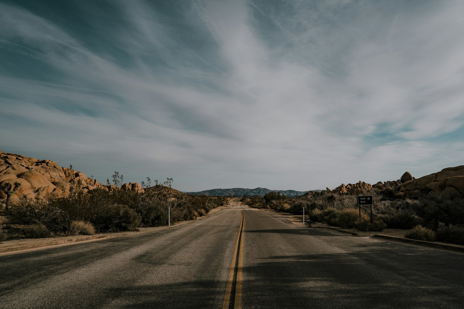 ZEISS Batis 25mm F2 sample photo. Empty straight concrete road photography