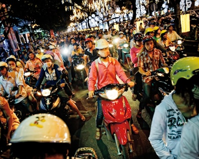 group of people riding a motorcycle