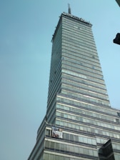 A vibrant flex print banner displayed outside a corporate office in Dubai.