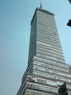 A large banner hanging on a building facade advertising a national company