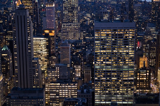 aerial photo of a lighted city buildings in Rockefeller Center United States