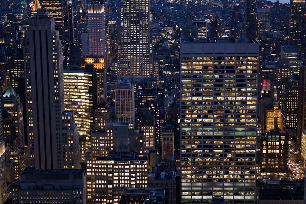 aerial photo of a lighted city buildings