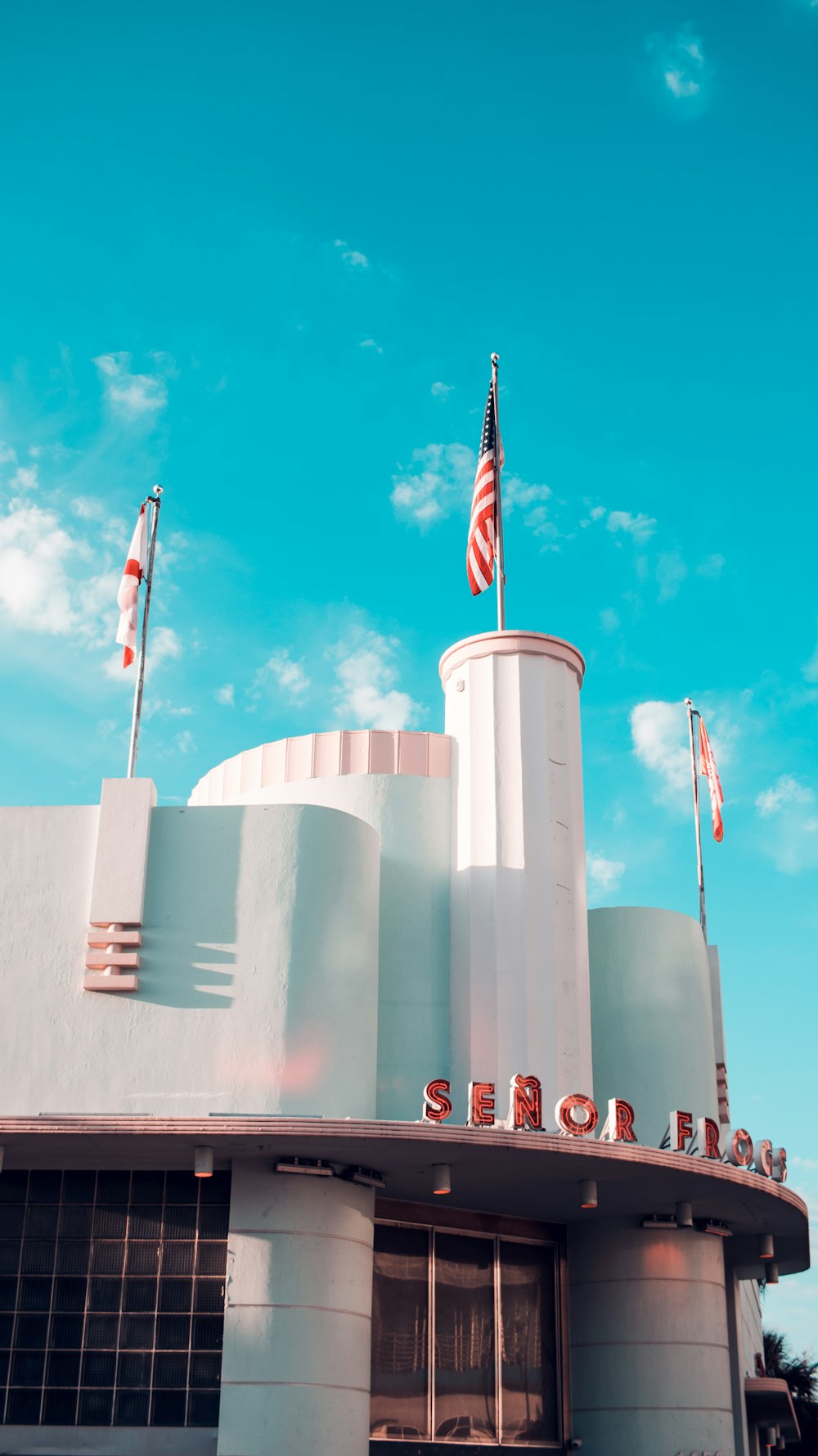 a large building with a flag on top of it