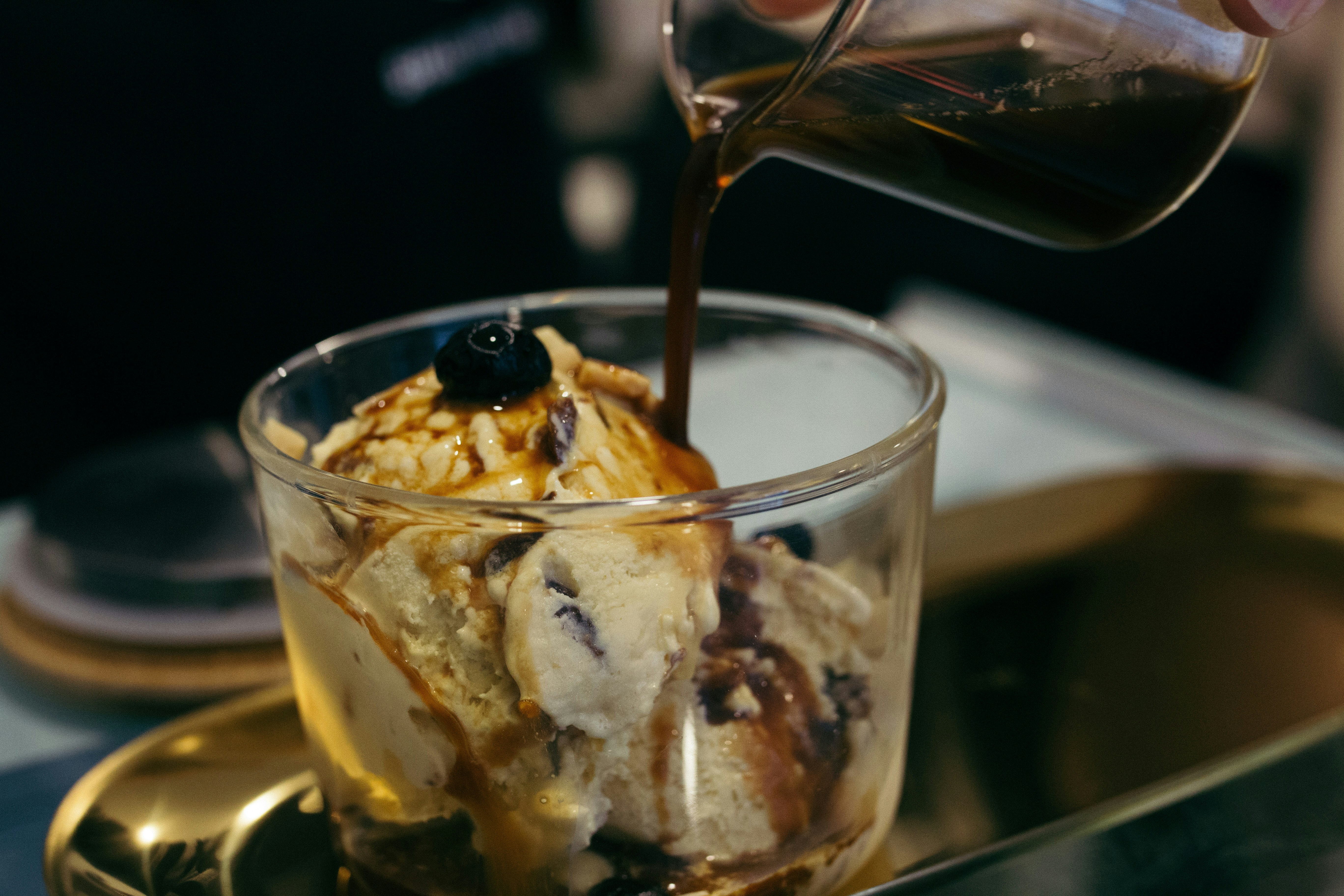 Cold Coffee With Ice Cream — Cold coffee topped with vanilla ice cream, warm food photography with rich colours