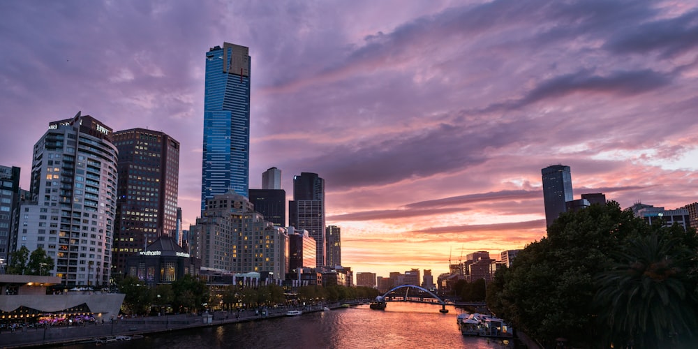 city skyline under cloudy sky during daytime