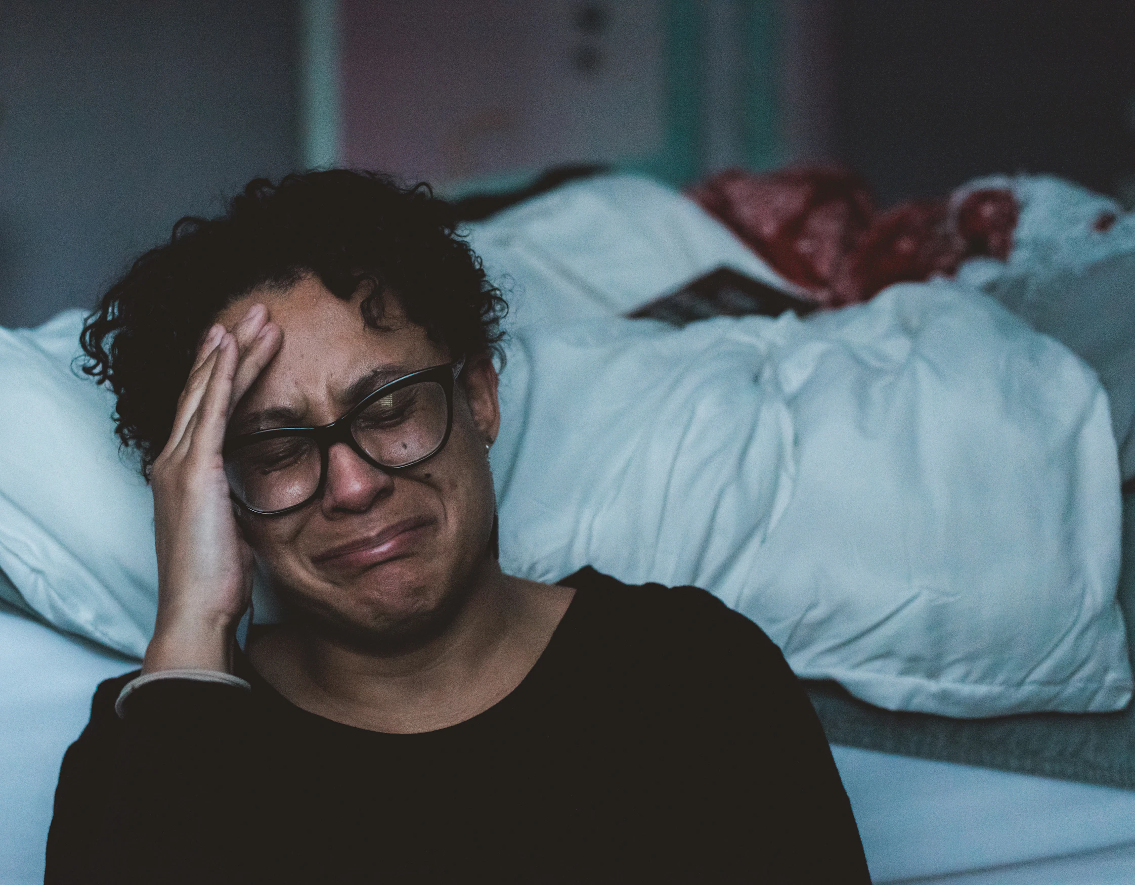 A quiet moment of remembrance and ritual representing memorial practices in perinatal loss care — DNT Network's Bereavement Doula Certification course teaches evidence-based memory-making, ritual, and long-arc continuing-bonds practices