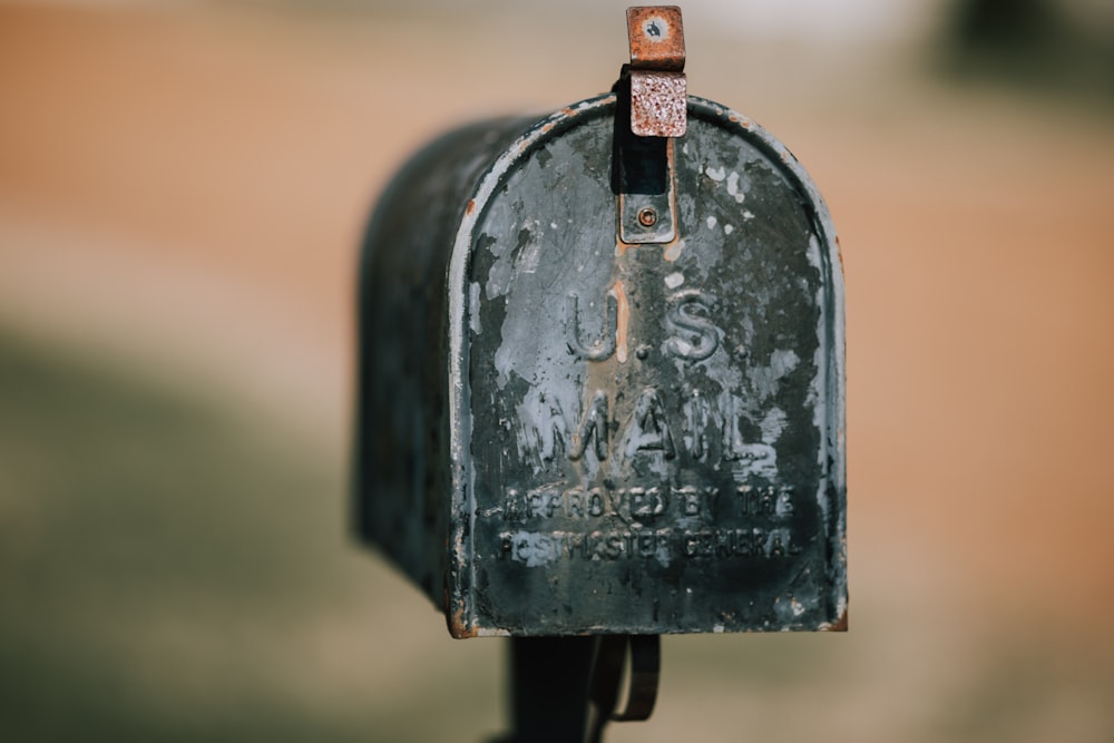 closeup photography of black U.S. mailbox