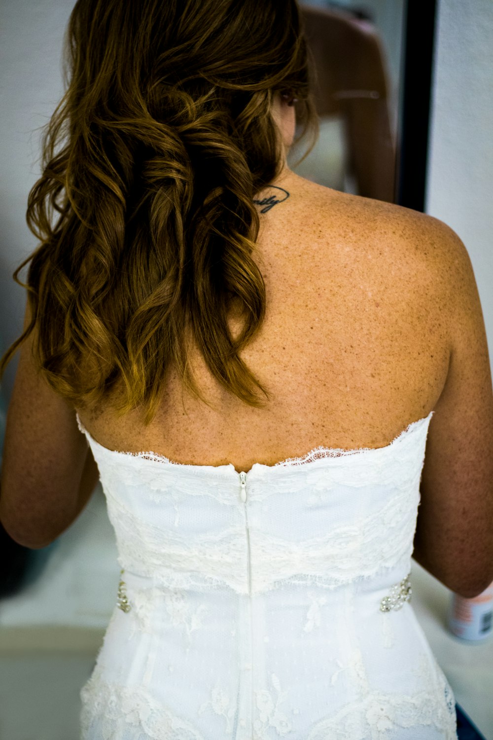 woman in white tube wedding