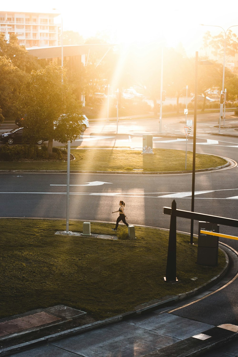 woman jogging on park during daytime