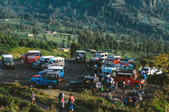 aerial photo of vehicles on ground in Bromo Tengger Semeru National Park Indonesia