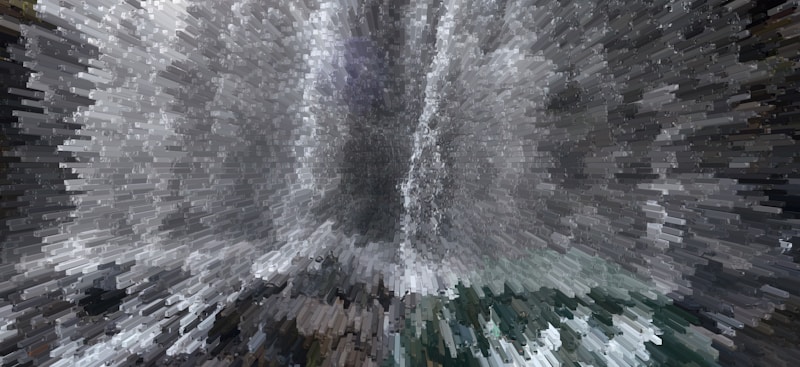 A digitally altered image creates a dynamic, pixelated effect resembling an abstract waterfall with cascading shapes and shades. The presentation is visually striking, turning an otherwise photographic scene into an intriguing piece of digital artwork.
