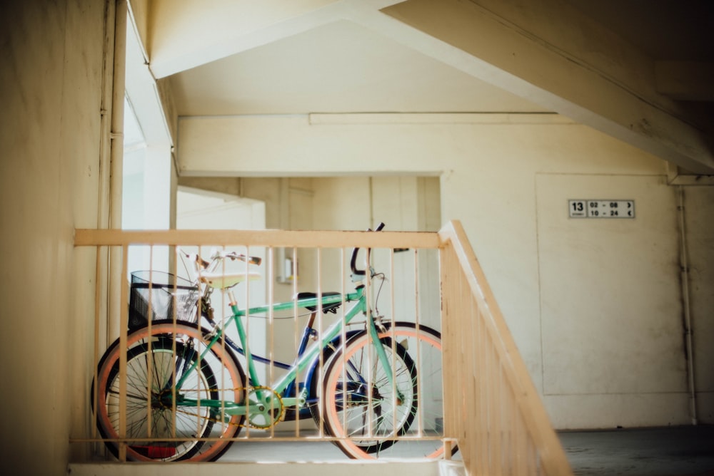 green and pink female's beach cruiser bike