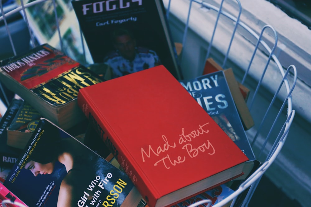 book lot on metal basket