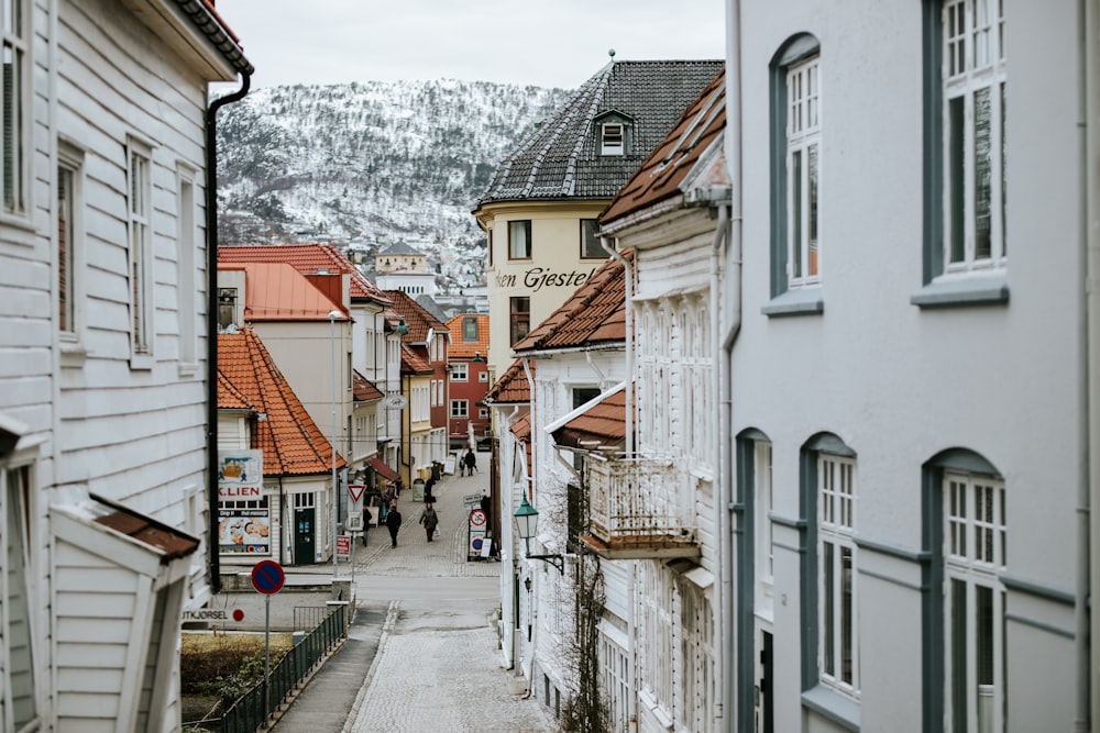 people walking towards street