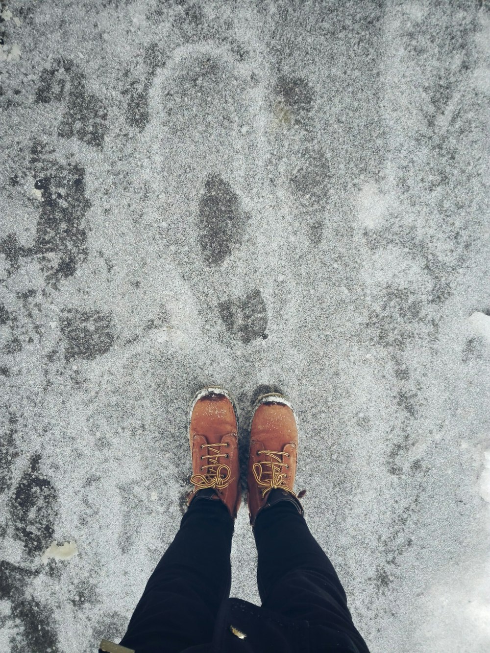 person standing on gray ground