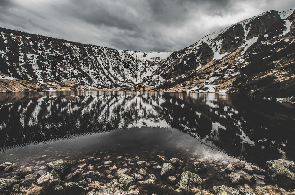 lake surrounded by mountain