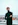 man standing near balcony