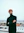 man standing near balcony