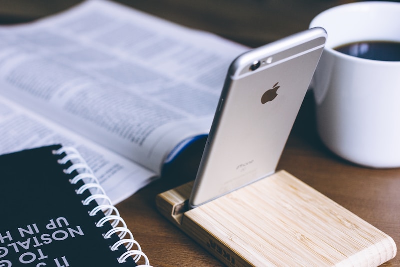 silver iPhone 6 on rack