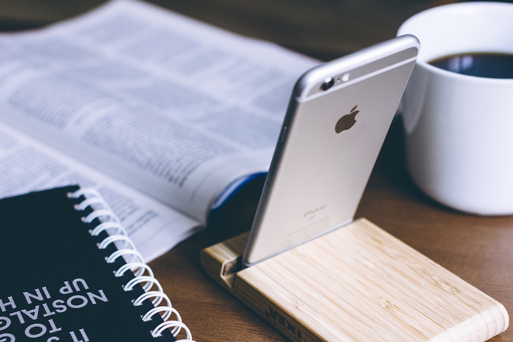 silver iPhone 6 on rack