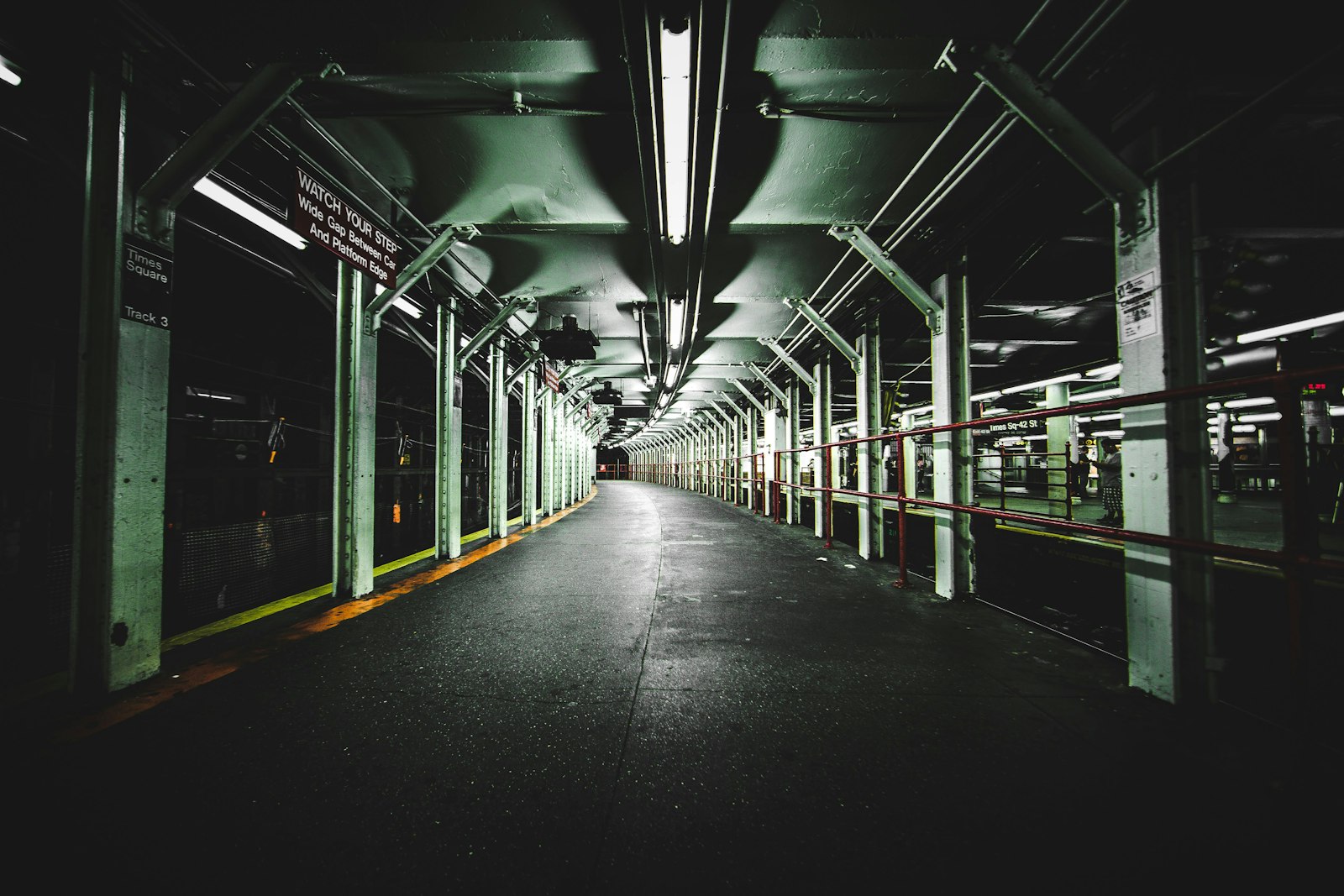 Canon EF 14mm F2.8L II USM sample photo. Lighted train station pathway photography