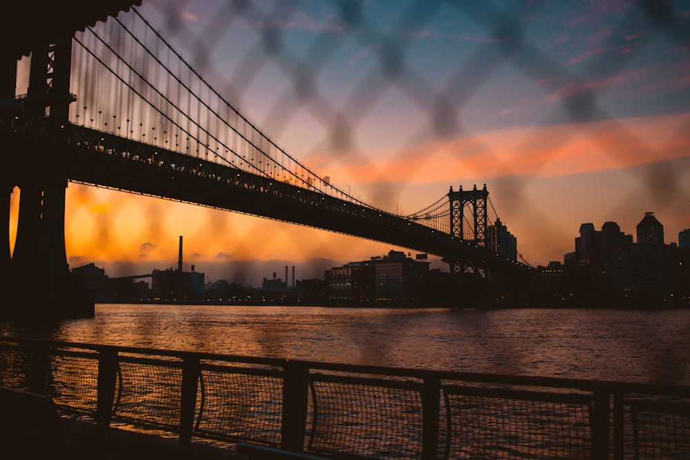 bottom view of black Brooklyn bridge