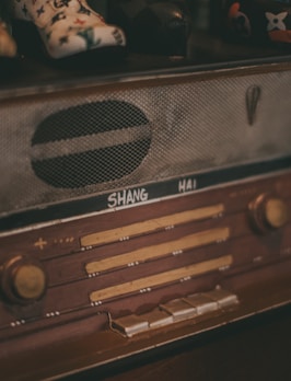 brown and black radio component