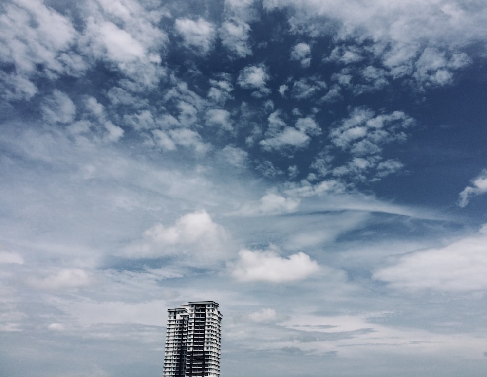 high rise building under blue sky