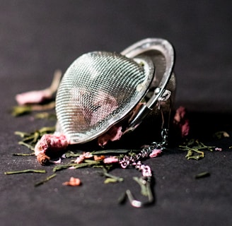 selective focus photography of round silver-colored accessory