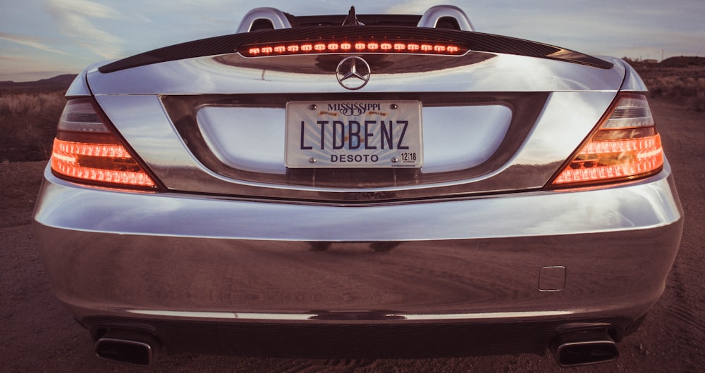 silver Mercedes-Benz car with LTDBENZ license plate